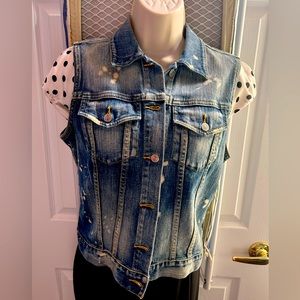 Cute distressed denim vest.